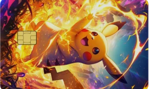 Pokémon full-colour metal card with yellow electric character and colourful flame artwork