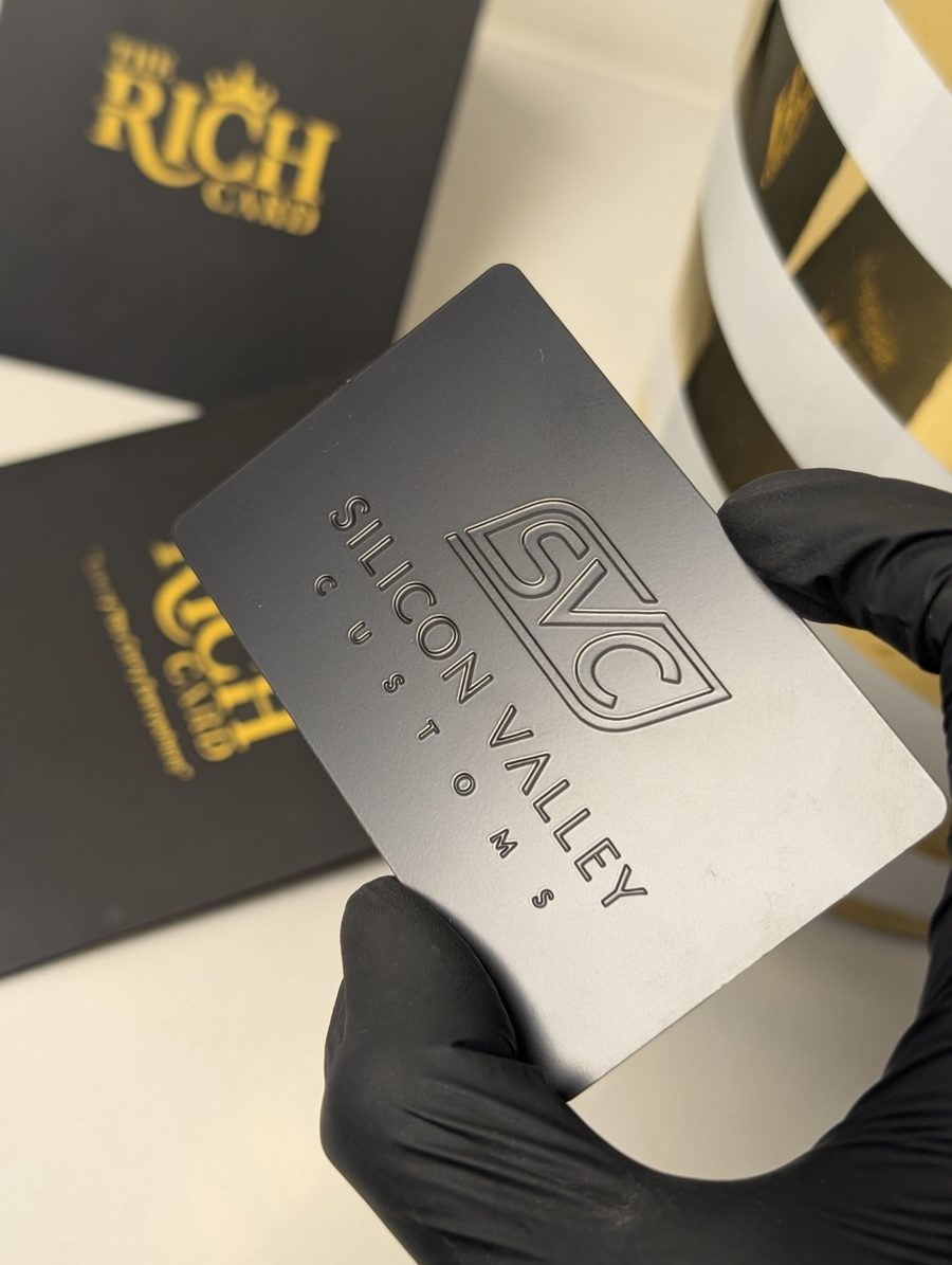 Metal brand card with engraved Silicon Valley Customs logo