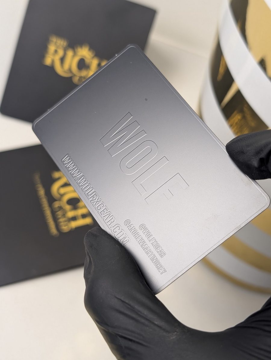 WOLF metal business card with engraved logo and contact details